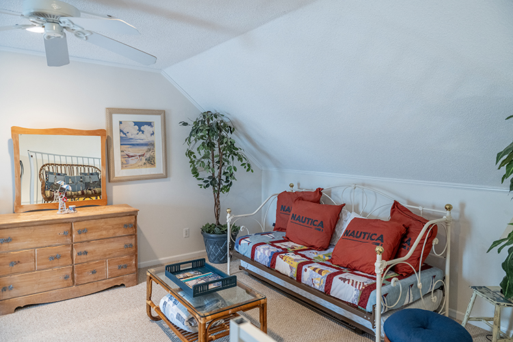 Spacious loft area with bed and seating